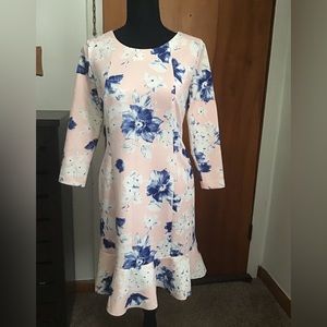 Flattering long sleeve ruffle hem floral dress
